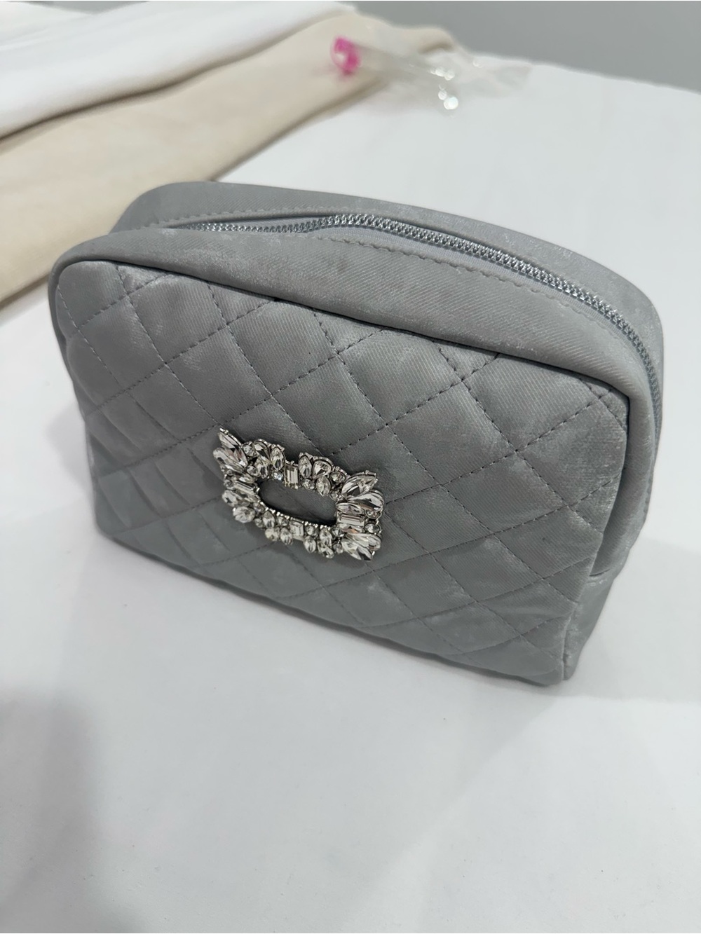 Elegant Quilted Gray Cosmetic Pouch with Crystal Accent